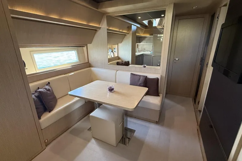 "alin 4ever" Yacht Photos Pics Luxurious interior of 2010 Riva 68 Ego Super yacht with elegant dining area.