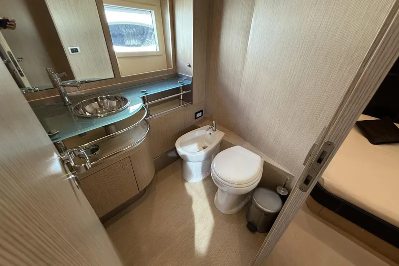 "alin 4ever" Yacht Photos Pics Luxurious bathroom interior of 2010 Riva 68 Ego Super yacht with modern fixtures.