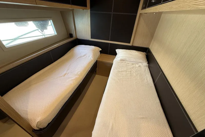 "alin 4ever" Yacht Photos Pics Twin beds in a cozy cabin of a 2010 Riva 68 Ego Super yacht.