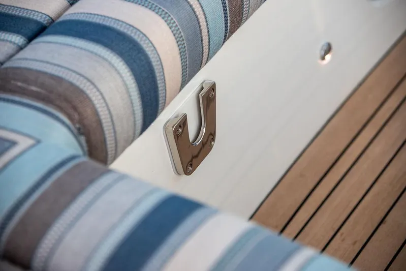 Cavu 4 Yacht Photos Pics Striped upholstery and teak deck on 2022 Hinckley Sport Boat 40 X.