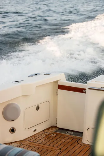 Cavu 4 Yacht Photos Pics Hinckley Sport Boat 40 X 2022 cruising on water, showcasing deck and wake.