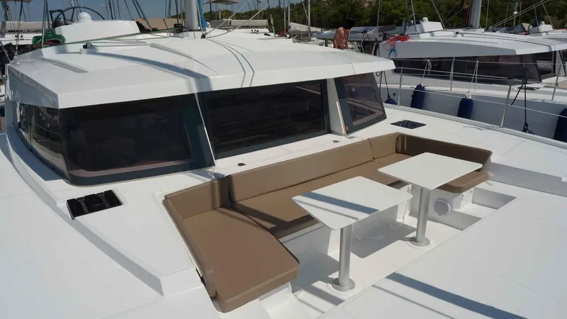  Yacht Photos Pics Bali 4.1 catamaran 2019 with outdoor seating and tables.