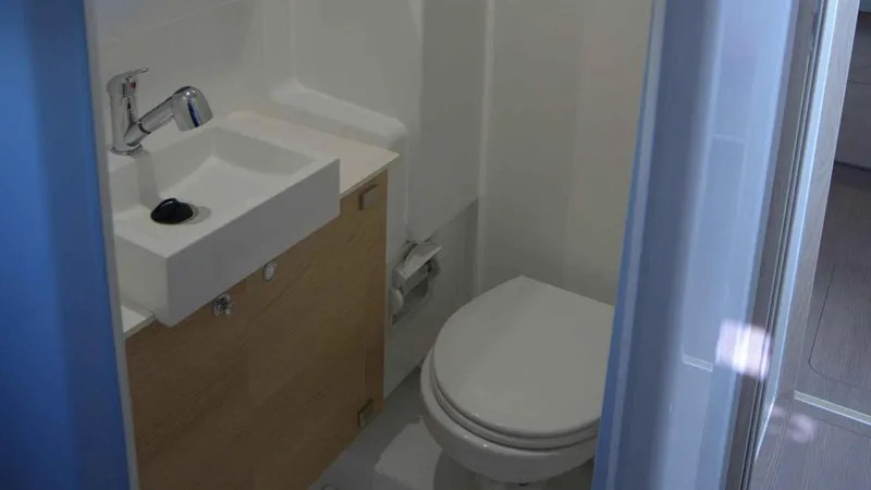  Yacht Photos Pics Compact bathroom in a 2019 Bali 4.1 model.