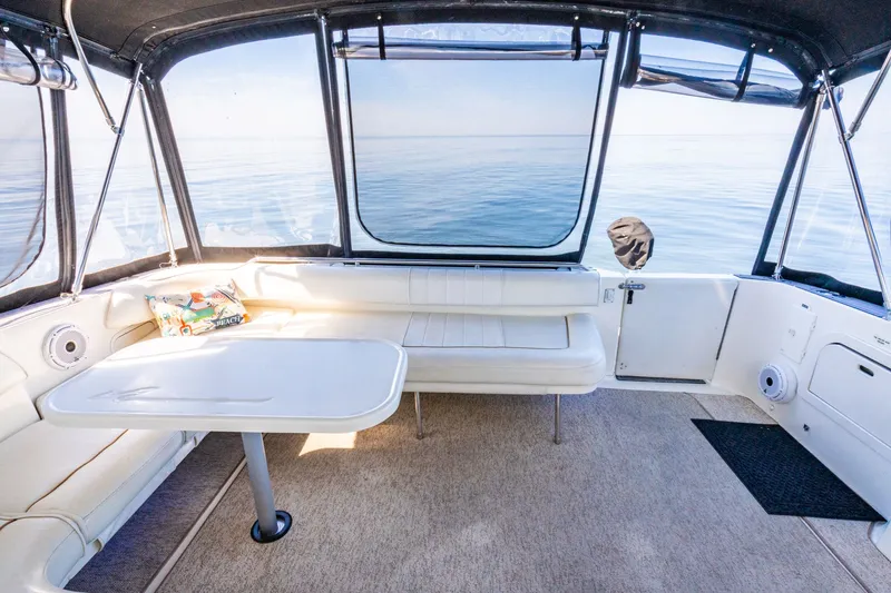  Yacht Photos Pics Interior of 1997 Sea Ray 400 Sundancer yacht with seating and ocean view.