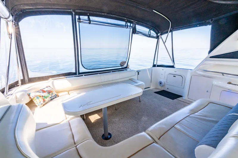  Yacht Photos Pics Interior of 1997 Sea Ray 400 Sundancer yacht with spacious seating and ocean view.