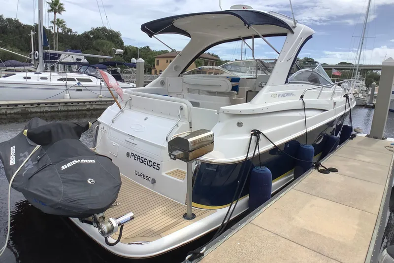 Perseides Yacht Photos Pics 2005 Regal Commodore 3860 yacht docked with Sea-Doo jet ski, Quebec registration.