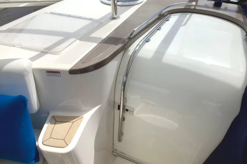 Perseides Yacht Photos Pics 2005 Regal Commodore 3860 yacht interior with sleek design and blue cushion.