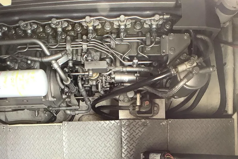 Perseides Yacht Photos Pics Engine compartment of a 2005 Regal Commodore 3860, showcasing intricate mechanical components.