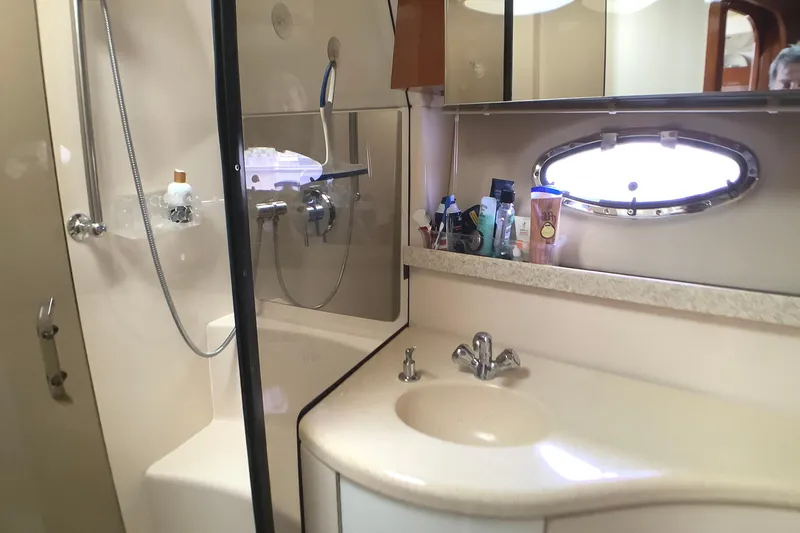 Perseides Yacht Photos Pics Bathroom interior of 2005 Regal Commodore 3860 yacht with shower and sink.