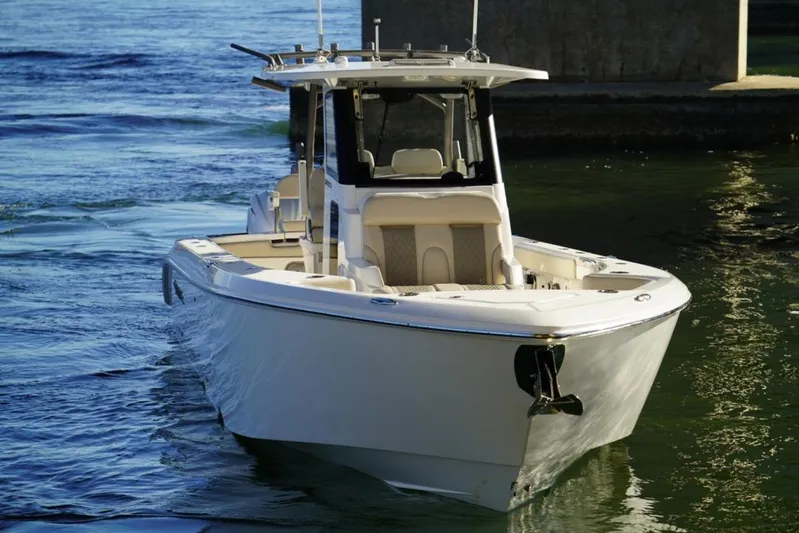  Yacht Photos Pics 2024 Solace 32 CS boat on water, showcasing sleek design and modern features.