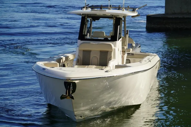  Yacht Photos Pics 2024 Solace 32 CS boat cruising on calm waters.