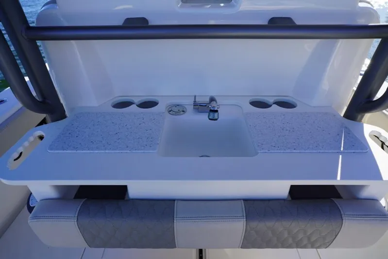  Yacht Photos Pics 2024 Solace 32 CS boat sink with countertop and cup holders.