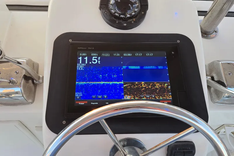 In 2 Deep Yacht Photos Pics Dashboard of 1984 Ocean Yachts 46 Super Sport with GPS and sonar display.