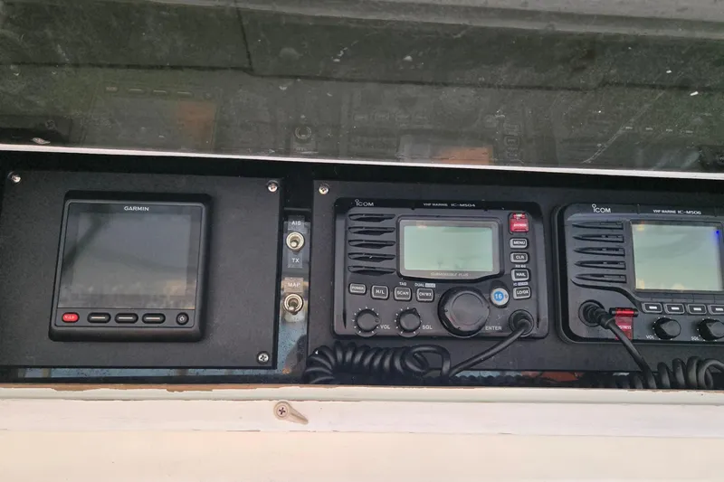 In 2 Deep Yacht Photos Pics Marine electronics on 1984 Ocean Yachts 46 Super Sport, featuring Garmin and Icom devices.