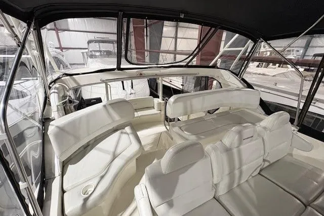 Go Jump In The Lake Yacht Photos Pics 2003 Silverton 39 Motor Yacht interior with white seating and spacious layout.