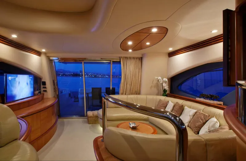  Yacht Photos Pics Luxurious interior of a 2006 Azimut 62 yacht with elegant seating and ambient lighting.