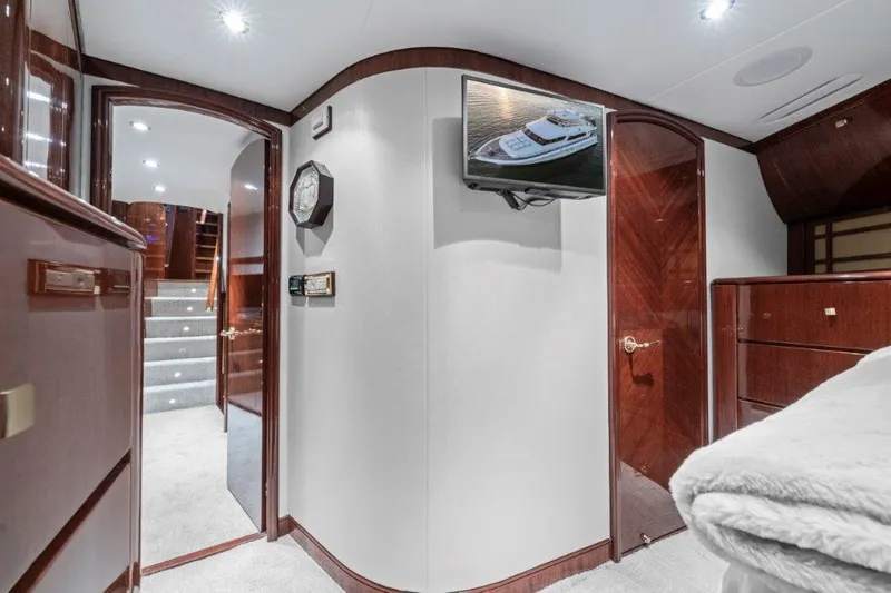 Amajen Yacht Photos Pics Luxurious interior of 2006 Cheoy Lee Motor Yacht with elegant wood finishes and modern amenities.