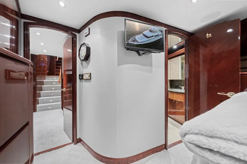 Amajen Yacht Photos Pics Luxurious interior of 2006 Cheoy Lee Motor Yacht with elegant wood finishes and modern amenities.