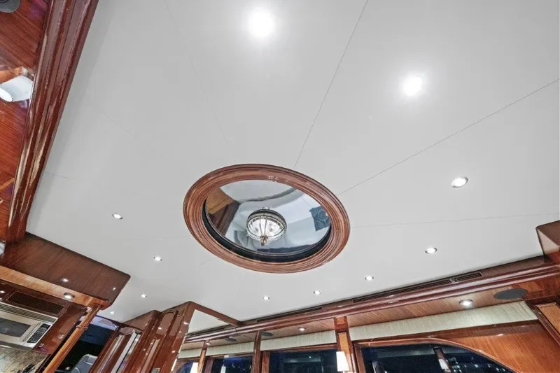 Amajen Yacht Photos Pics Ceiling view of 2006 Cheoy Lee Motor Yacht with elegant wood accents and lighting.