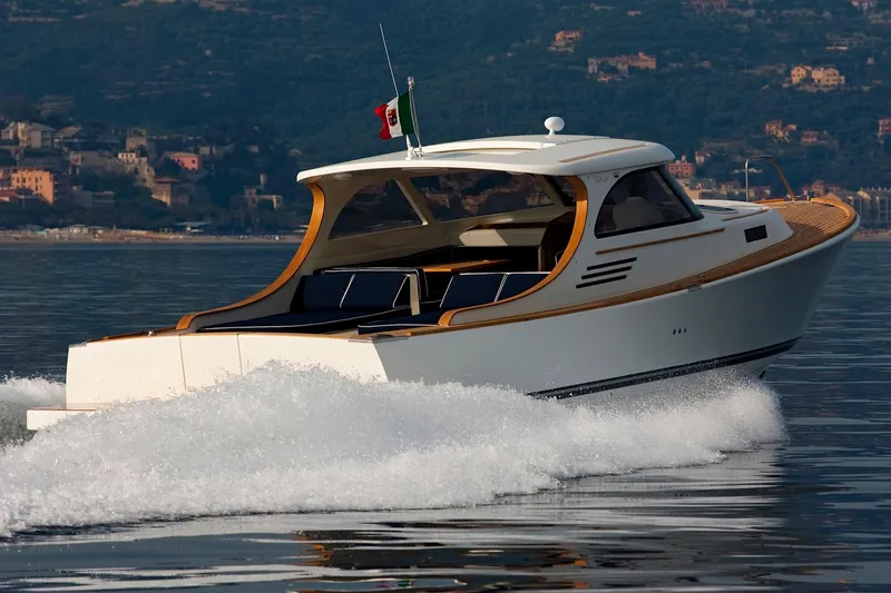 36 Yacht Photos Pics Luxurious Toy 36 yacht cruising on calm waters, 2025 model.