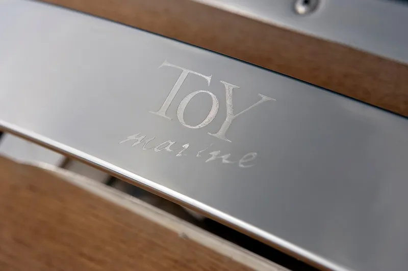 36 Yacht Photos Pics Engraved "Toy Maine" logo on metallic surface, Toy 36 model, 2025.