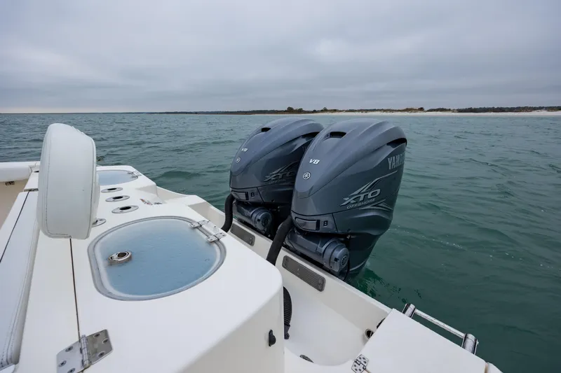  Yacht Photos Pics 2020 Cobia 350 Center Console with twin Yamaha outboard engines on open water.