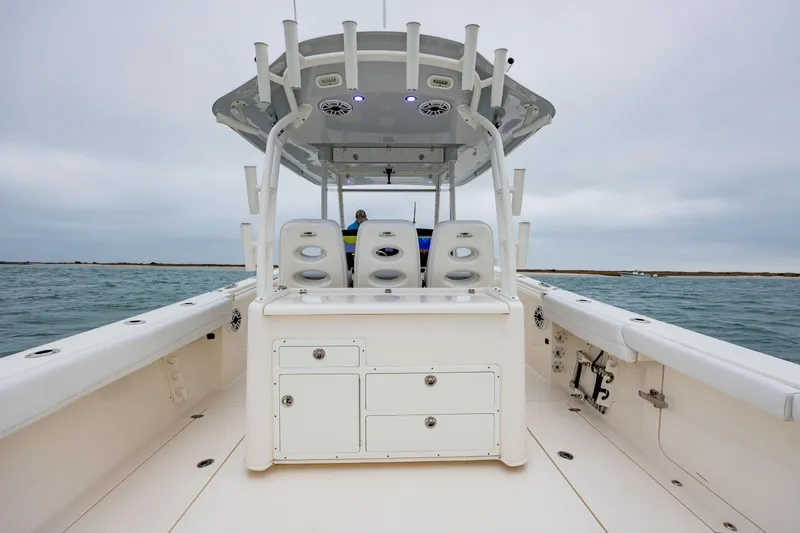  Yacht Photos Pics 2020 Cobia 350 Center Console boat on open water, featuring spacious seating and storage.