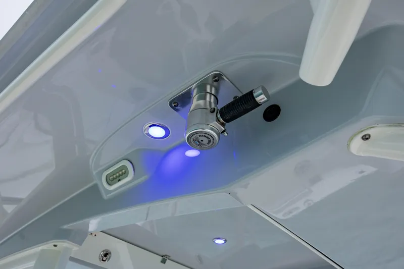  Yacht Photos Pics 2020 Cobia 350 Center Console boat with blue LED lights and mounted equipment.