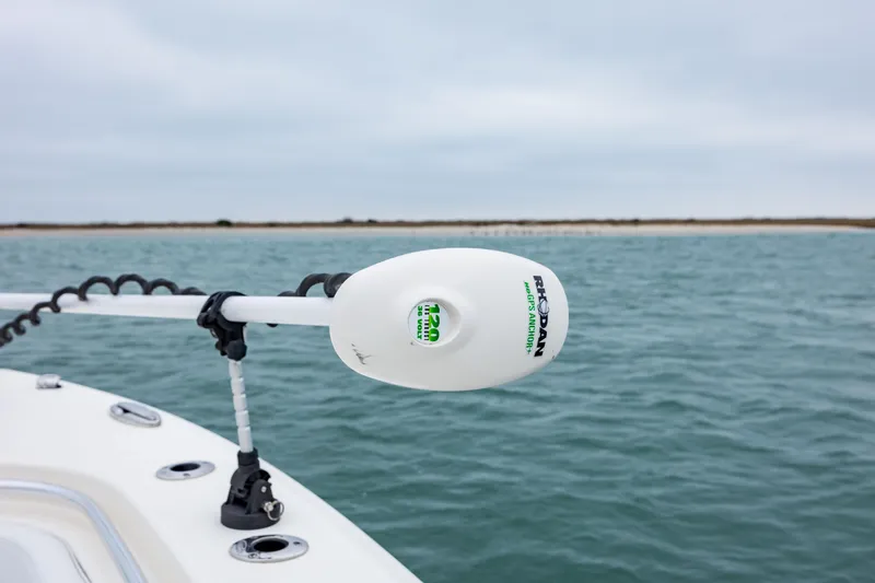  Yacht Photos Pics 2020 Cobia 350 Center Console boat with Minn Kota trolling motor on open water.