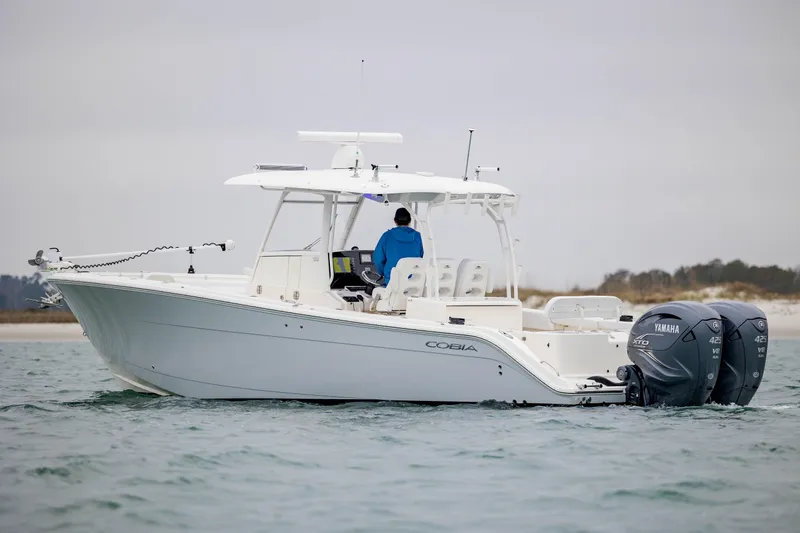  Yacht Photos Pics 2020 Cobia 350 Center Console boat on water with dual Yamaha engines.