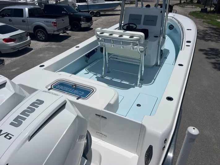  Yacht Photos Pics 2023 Contender 25 Tournament boat with dual engines, spacious deck, and modern console.