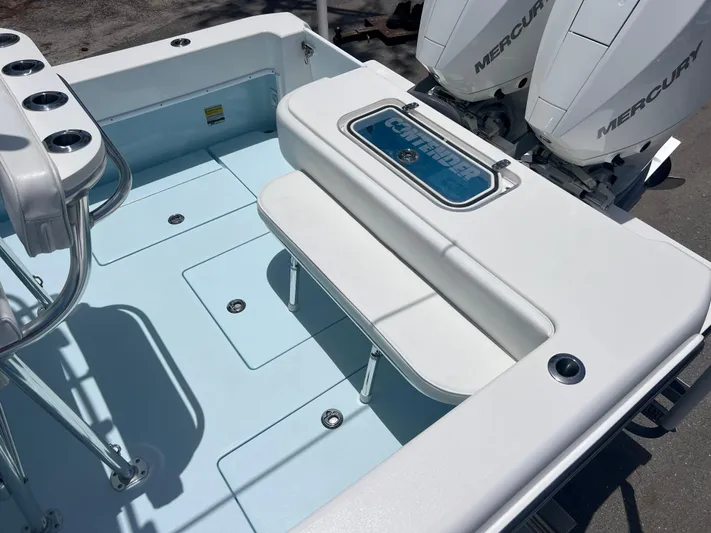  Yacht Photos Pics 2023 Contender 25 Tournament boat deck with seating and Mercury engines.