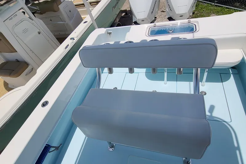  Yacht Photos Pics 2023 Contender 25 Tournament boat interior with seating and rod holders.