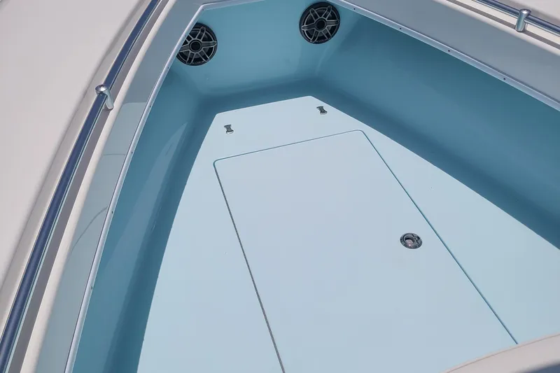  Yacht Photos Pics 2023 Contender 25 Tournament boat interior with storage compartment and speakers.