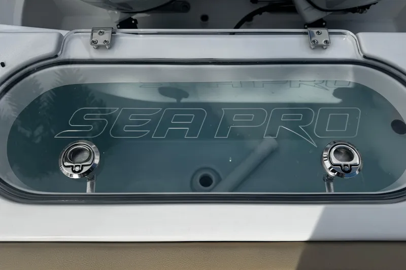  Yacht Photos Pics 2026 Sea Pro 262 Offshore livewell with logo and stainless steel fittings.