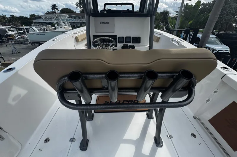  Yacht Photos Pics 2026 Sea Pro 262 Offshore boat interior with rod holders and helm station.