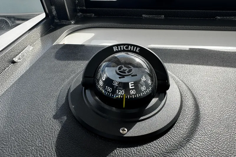  Yacht Photos Pics Compass on 2026 Sea Pro 262 Offshore boat dashboard, displaying cardinal directions.
