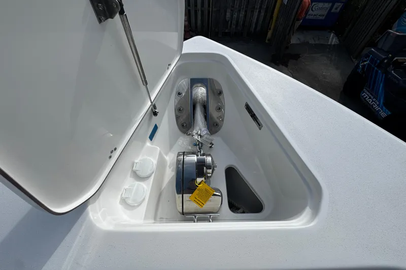  Yacht Photos Pics 2026 Sea Pro 262 Offshore anchor compartment with open hatch and visible winch.