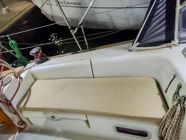 Tiffany Nicole Yacht Photos Pics 2011 Beneteau Oceanis 43 Family sailboat cockpit with beige cushion and nautical equipment.