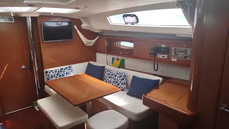 Tiffany Nicole Yacht Photos Pics Interior of 2011 Beneteau Oceanis 43 Family yacht with cozy seating and modern amenities.