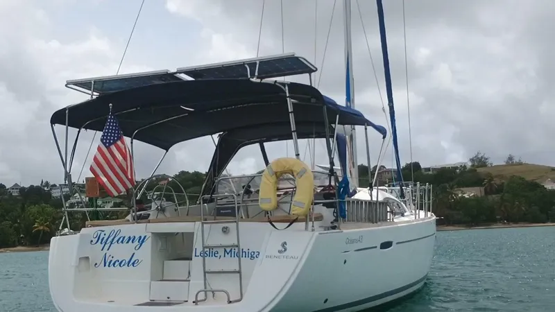 Tiffany Nicole Yacht Photos Pics 2011 Beneteau Oceanis 43 Family sailboat anchored in scenic waters.
