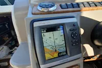 Garmin GPSmap 540s on 2008 Rinker 260 boat dashboard, displaying navigation map.