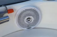 White marine speaker on a 2008 Rinker 260 boat interior.