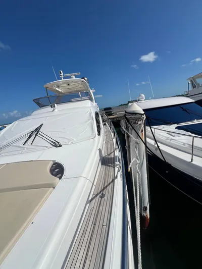 Lula Yacht Photos Pics Azimut 54fly 2016 yacht docked under clear blue sky.