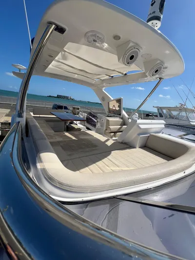 Lula Yacht Photos Pics 2016 Azimut 54fly yacht with spacious deck, luxurious seating, and ocean view.