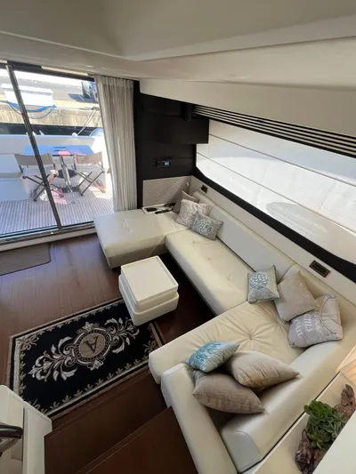 Lula Yacht Photos Pics Luxurious interior of 2016 Azimut 54fly yacht with elegant seating and modern decor.