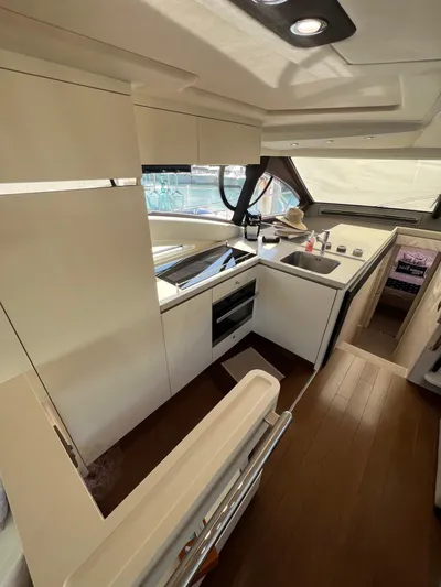 Lula Yacht Photos Pics 2016 Azimut 54fly yacht kitchen interior with modern appliances and sleek design.