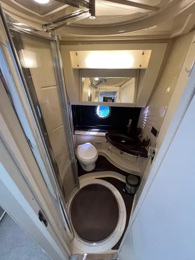 Lula Yacht Photos Pics Luxurious bathroom in 2016 Azimut 54fly yacht with modern fixtures and elegant design.