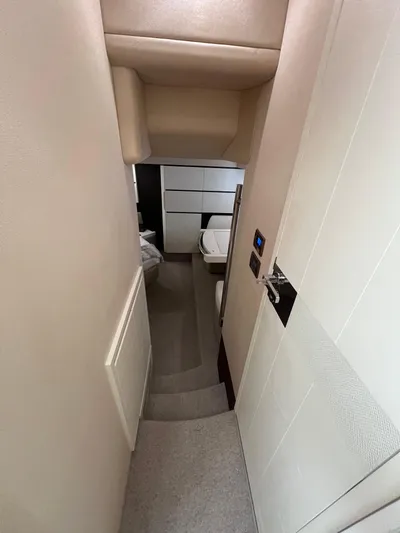 Lula Yacht Photos Pics Interior hallway of 2016 Azimut 54fly yacht, featuring modern design and neutral tones.