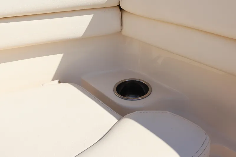  Yacht Photos Pics 2017 Grady-White Canyon 306 boat interior with cup holder and cushioned seating.